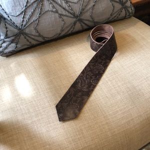 Leather hand tooled paisley tie